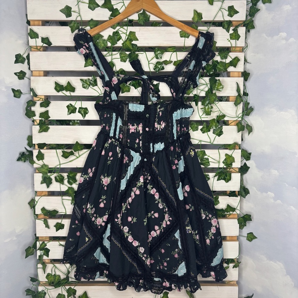 New without tag 
For Love And Lemons Black and Pink Floral Mini Dress
